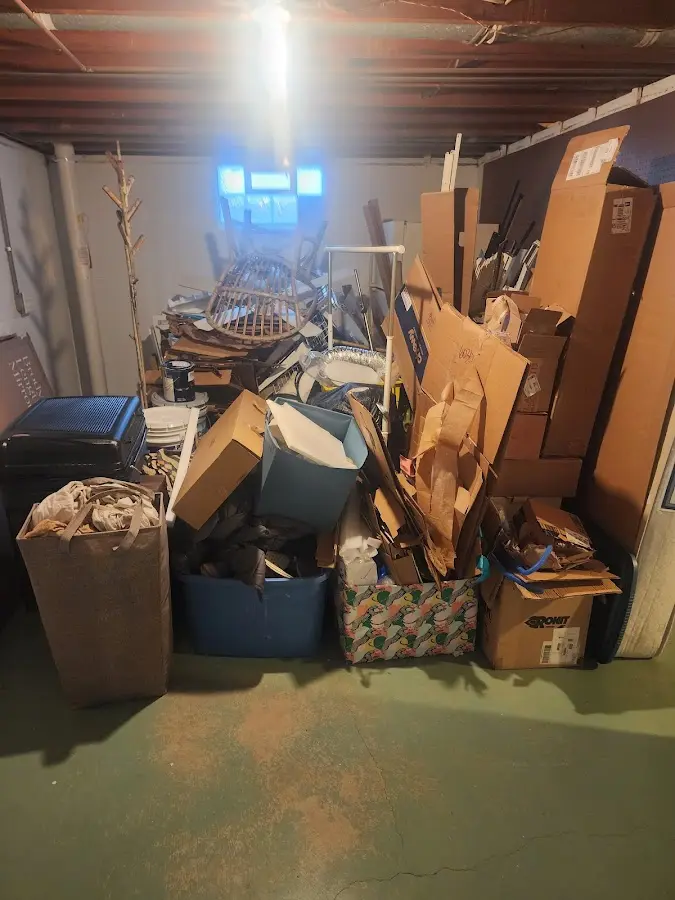 Roll-off dumpster container at job site for 2 Yard Dumpster Rental in Jim Thorpe